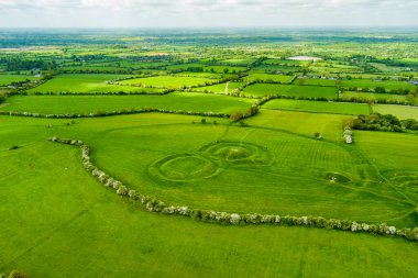 Aerial view of the Hill of Tara, an archaeological complex, containing a number of ancient monuments and, according to tradition, used as the seat of the High King of Ireland, County Meath, Ireland clipart