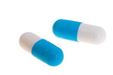 tıbbi kapsüller beyaz arkaplanda izole