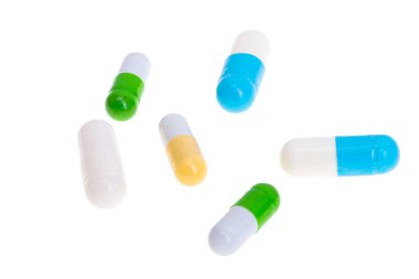 tıbbi kapsüller beyaz arkaplanda izole