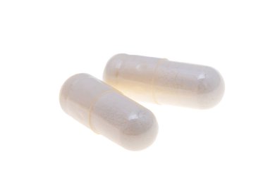 tıbbi kapsüller beyaz arkaplanda izole