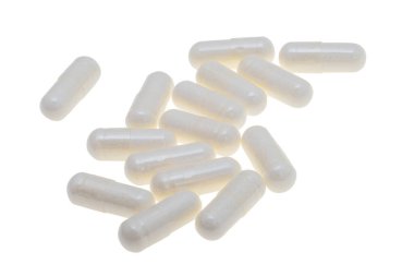 Beyaz arkaplan üzerinde izole edilmiş beyaz kapsüller