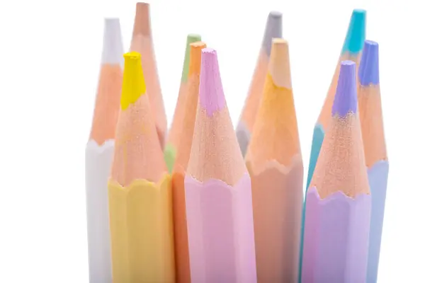 पांढरा पार्श्वभूमीवर वेगळे रंगीत पेन्सिल विना-रॉयल्टी स्टॉक इमेज