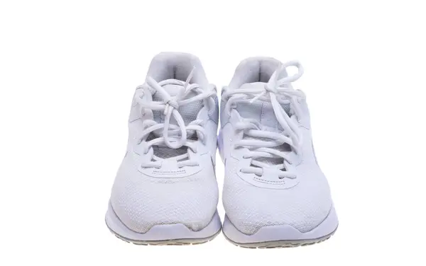 与白色背景隔离的妇女运动鞋 免版税图库照片