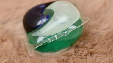 arkaplandaki yıkama kapsüllerini kapat