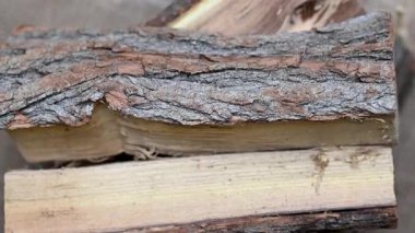 background of chopped firewood close up
