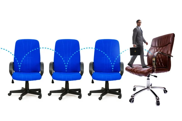 Förderkonzept Mit Bürostühlen Und Geschäftsmann — Stockfoto