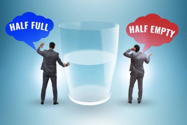 Businessman in the half empty half full glass concept clipart