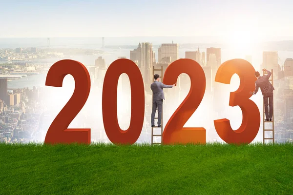 Concept of the new year of 2023 with business people