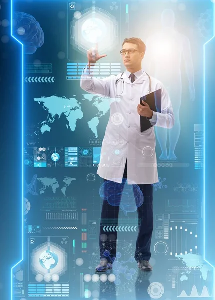 The doctor in futuristic medical concept pressing button