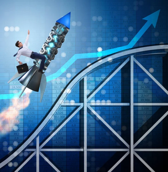 The male businessman flying on rocket in business concept