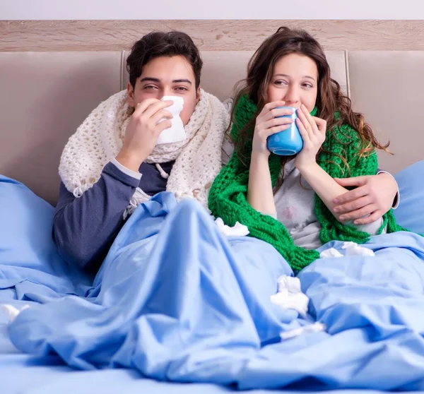 The sick wife and husband in bed in home
