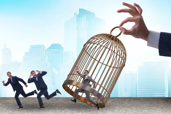 stock image Business people and the golden cage concept