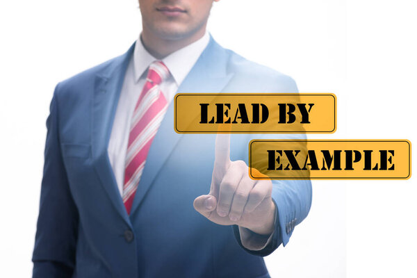 Businessman in the lead by example concept