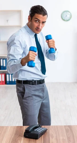 Young Handsome Employee Doing Sport Exercises Workplace — Stock Photo, Image