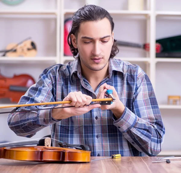 Young Handsome Repairman Repairing Violin — Stock Photo, Image