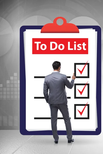 stock image The concept of to do list with businessman