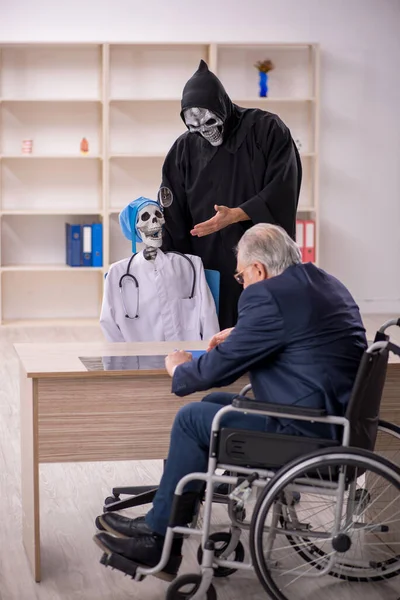 Old Male Patient Wheel Chair Visiting Two Devil Doctors — Stock Photo, Image