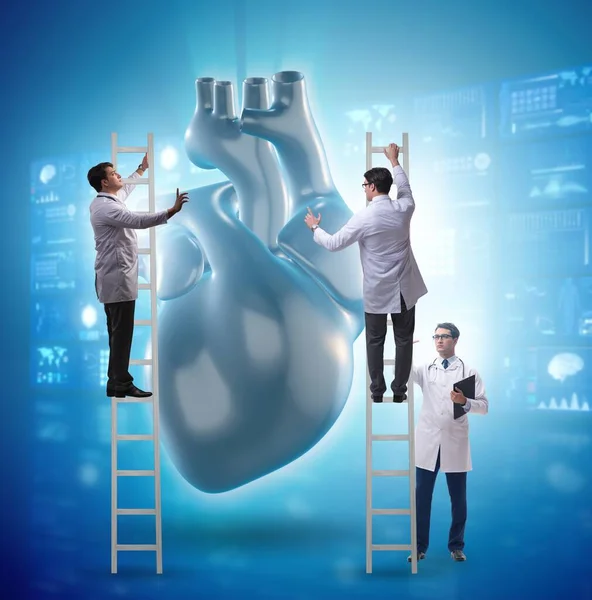 The heart examination by a team of doctors