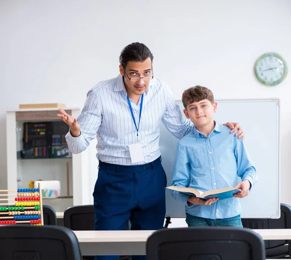 Young Father Helping His Son Prepare Exam — Stock Photo, Image
