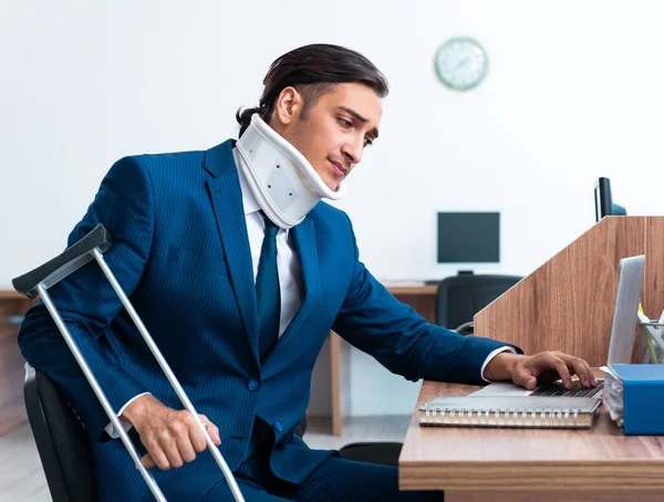 The young employee after accident in the office