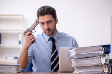 Young businessman employee committing suicide in the office