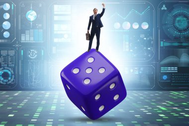 Businessman in uncertainty concept with the dice
