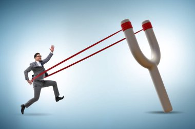 Kariyer konseptinde sapandan fırlatılan iş adamı