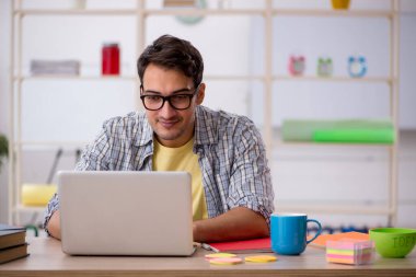 Young freelancer working from home during pandemic clipart