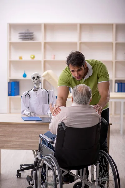 Old Male Patient Wheel Chair Visiting Skeleton Doctor — Stock Photo, Image