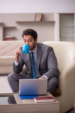 Young employee working from home during pandemic