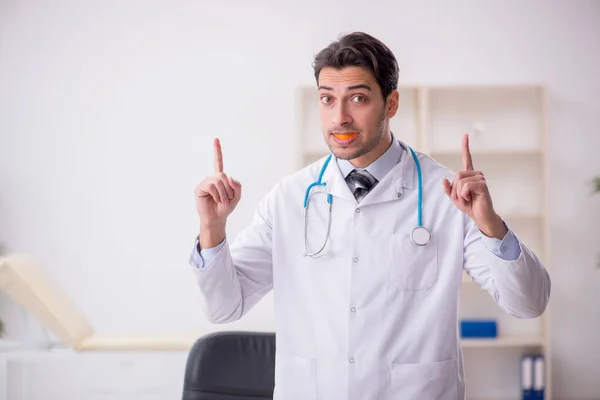 Young Doctor Wearing Mouthguard Clinic —  Fotos de Stock