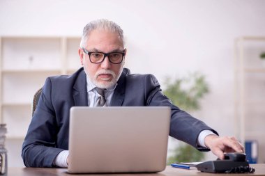 Old boss employee and too much work at workplace