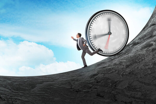 Businessman in time management concept