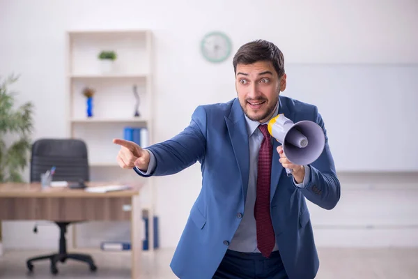 Young Employee Holding Megaphone Office — Stockfoto