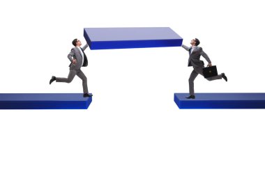 Concept of teamwork with the bridge being built