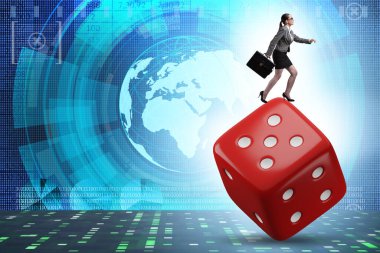Businesswoman in uncertainty concept with the dice