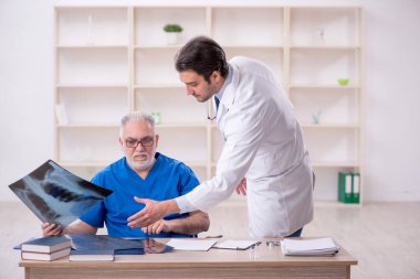 Two doctors radiologists working at the hospital