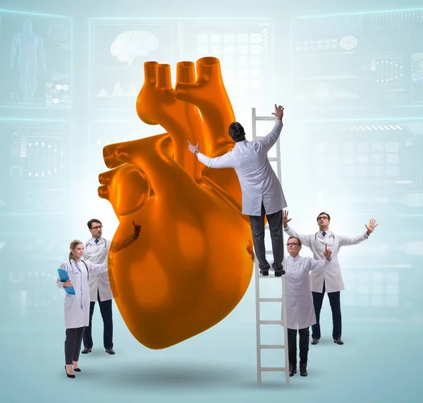 The heart examination by a team of doctors