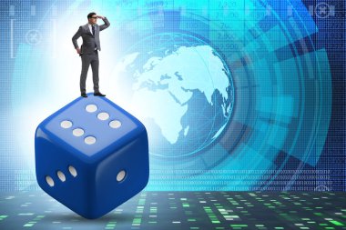Businessman in uncertainty concept with the dice