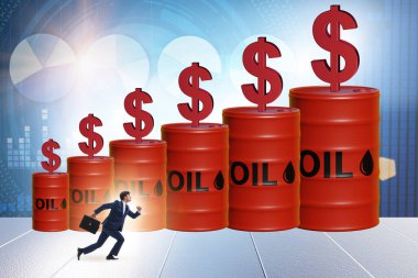 Businessman in the oil prices concept
