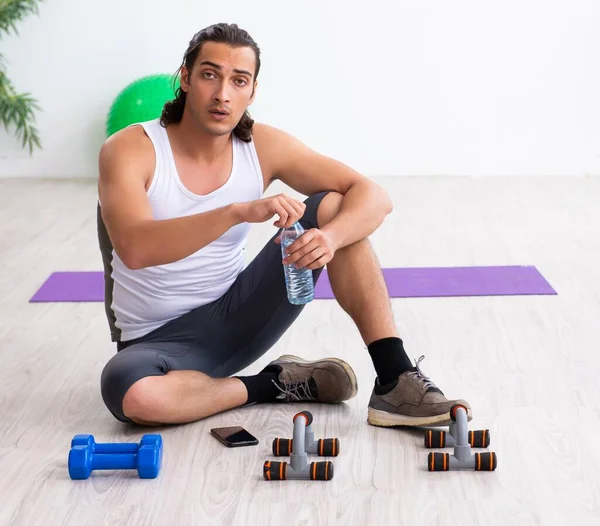 Young Handsome Man Doing Sport Exercises Indoors — Stock Photo, Image