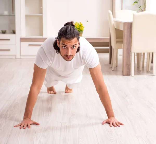 Young Man Doing Physical Exercises Home — Stock Photo, Image
