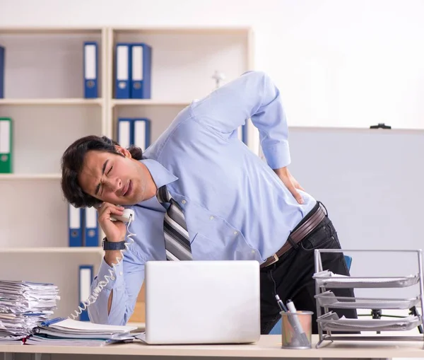 Young Handsome Male Employee Doing Exercises Office — Foto de Stock