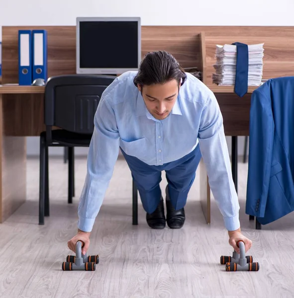 Young Handsome Businessman Doing Exercises Workplace — Stock Photo, Image