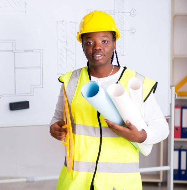 The young black architect working on project