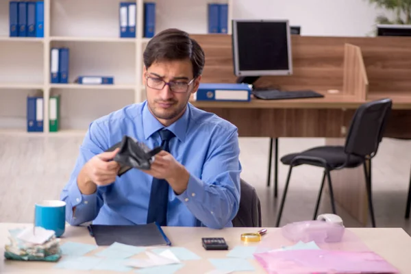 stock image Young accountant working in the office