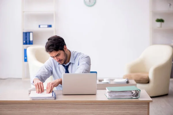 stock image Young businessman employee sitting at workplace