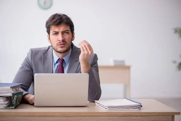 Young Employee Unhappy Excessive Work Workplace — Stockfoto