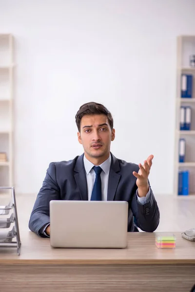 stock image Young businessman employee working in the office