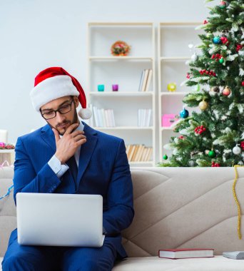 Noel 'de evde çalışan işadamı.